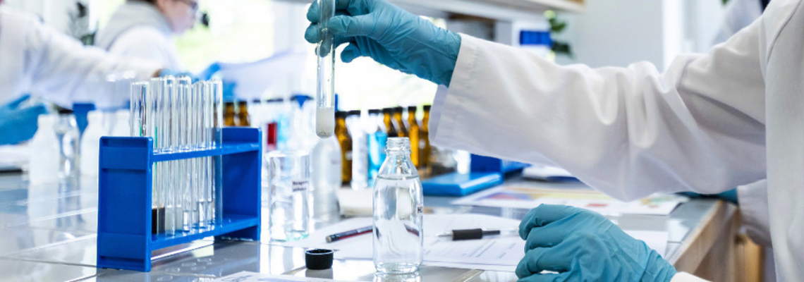 A researcher conducts scientific research in a chemistry laboratory using laboratory equipment.